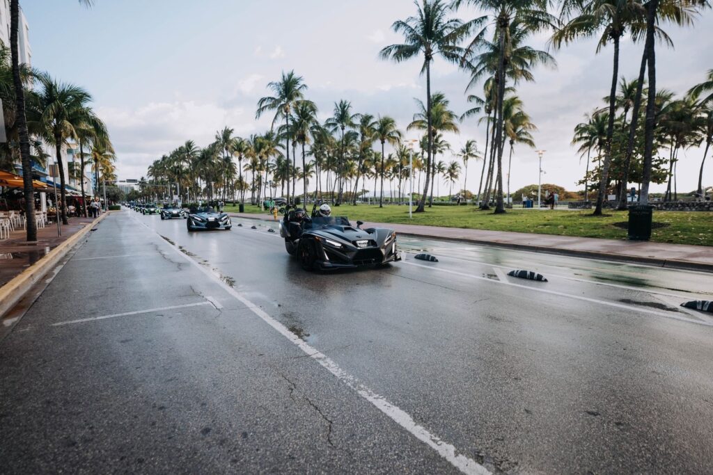 A Polaris Slingshot cruising Ocean Boulevard in South Beach