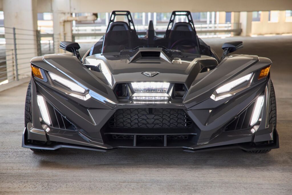 Front view of a black Polaris Slingshot R at the Diplomat Beach Resort