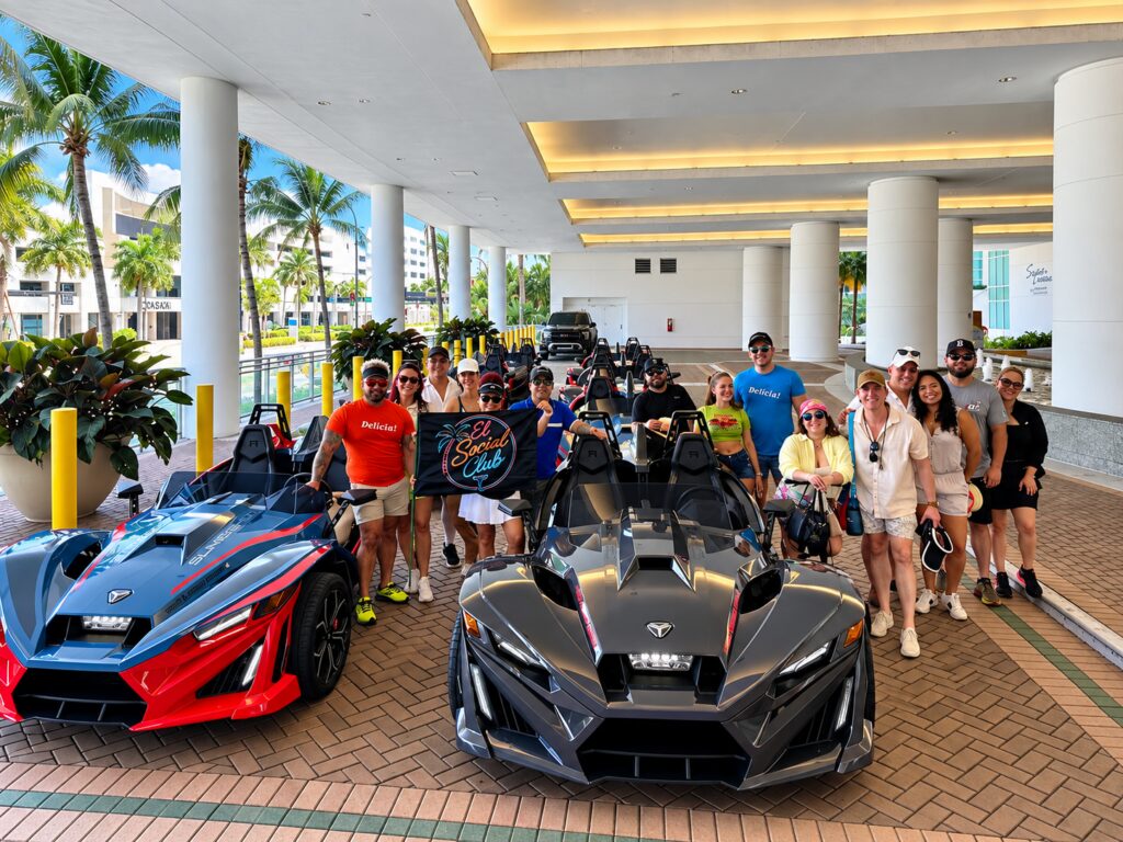 A group of customers with their Polaris Slingshots before setting off