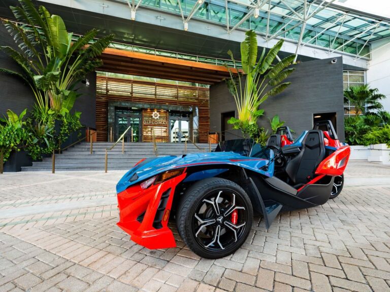 A red and blue Polaris Slingshot at the Diplomat Beach Resort entrance